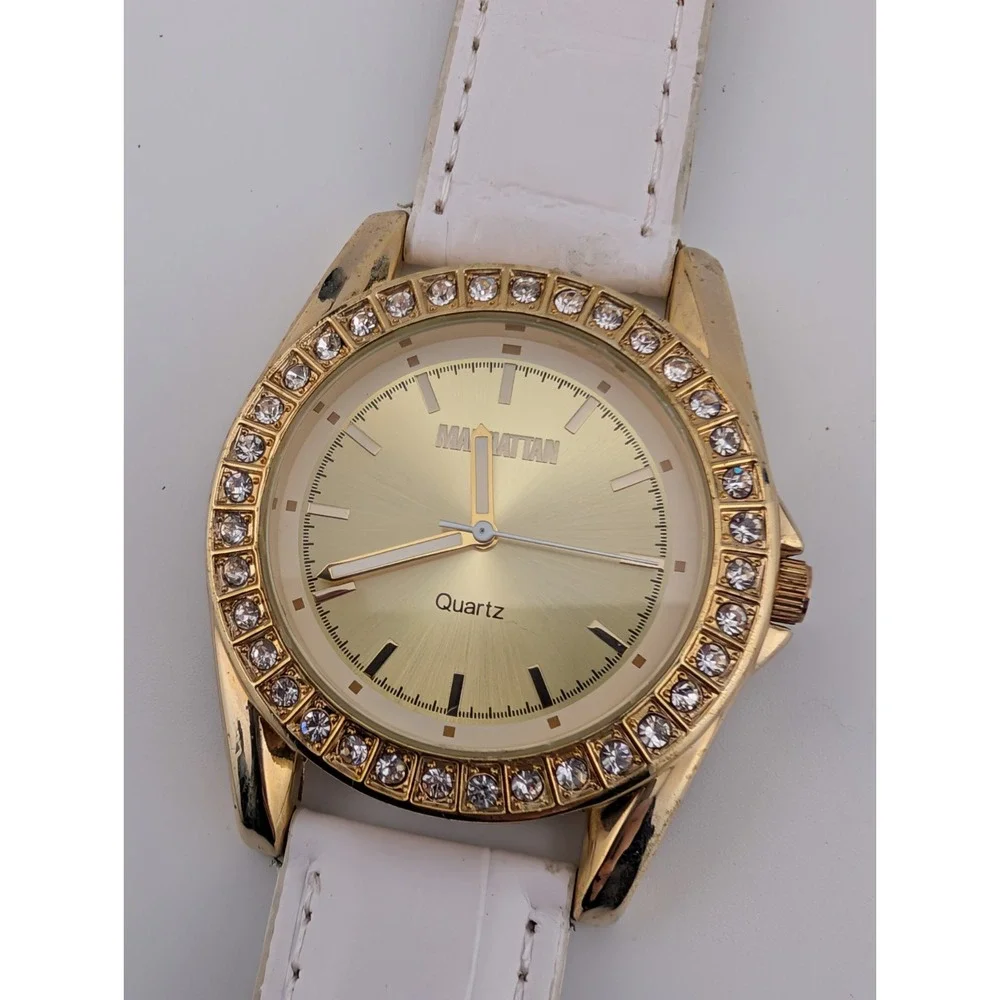 Manhattan by Croton Watch Women 40mm Case Pave Bezel White Band- New Battery‎
